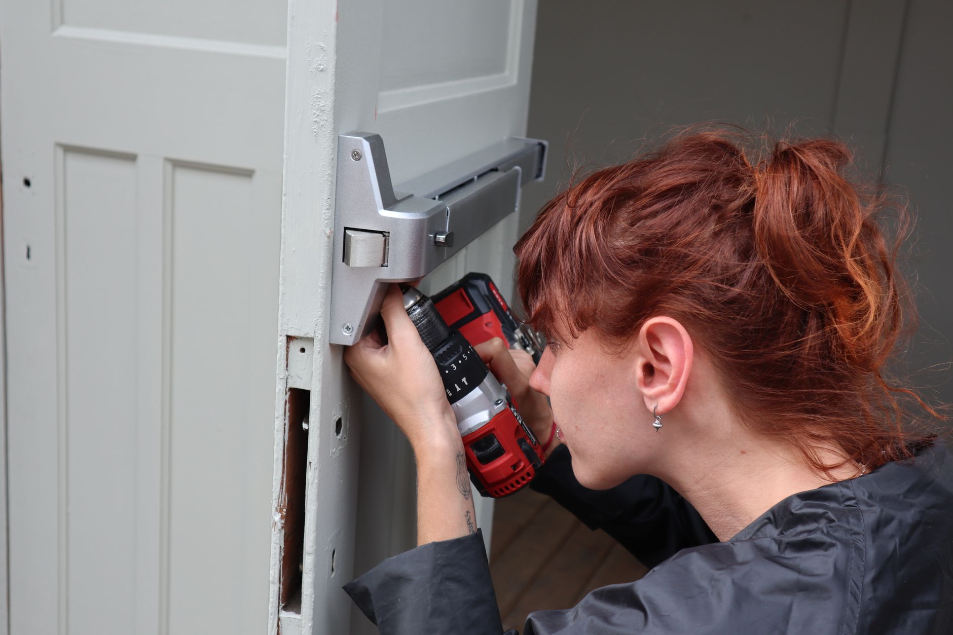 Fitting a door lock with a power drill