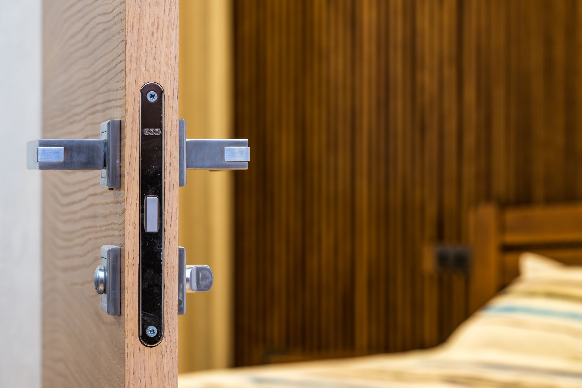 Interior door with a privacy lock and handle