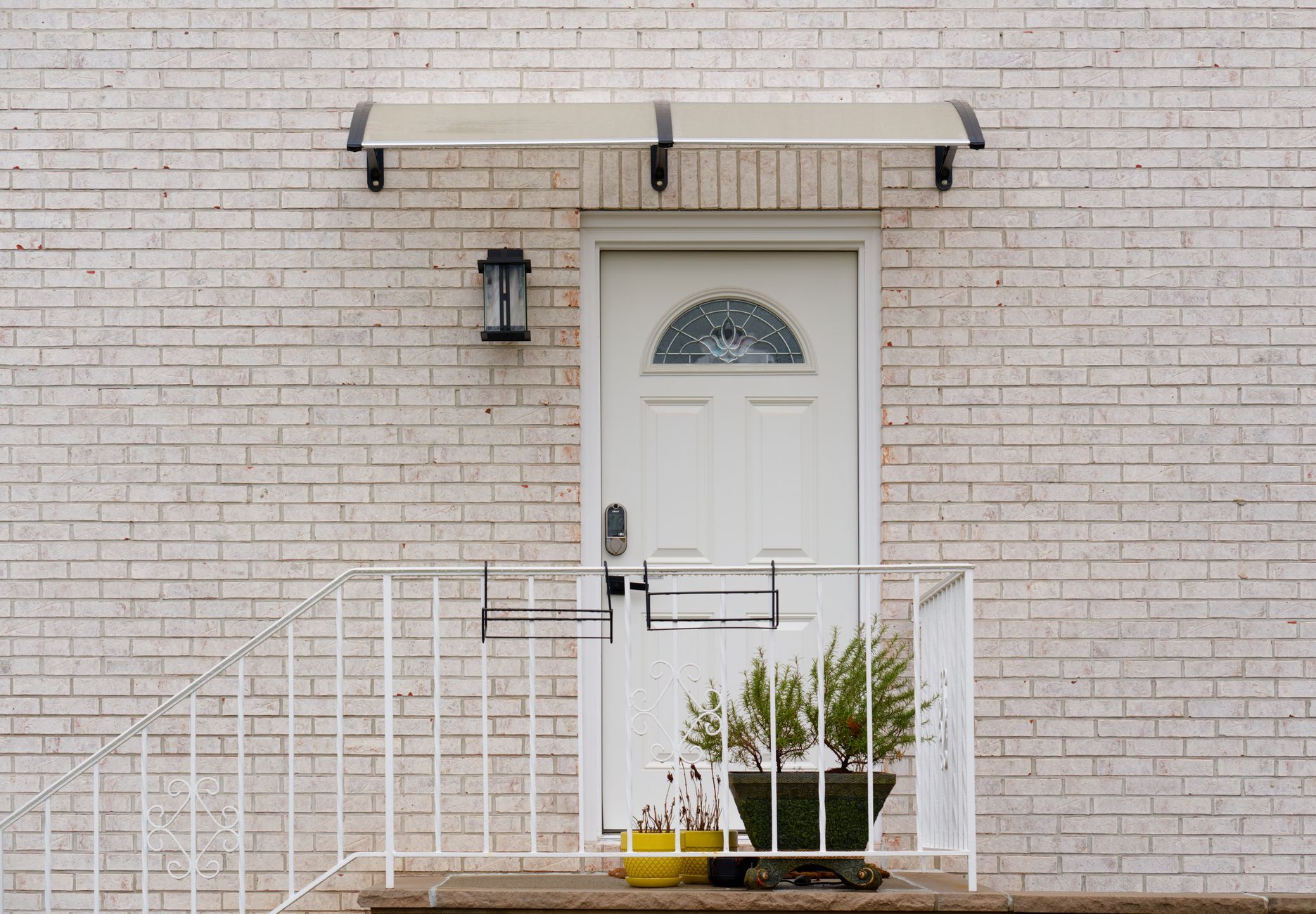 White uPVC-style front door of a house